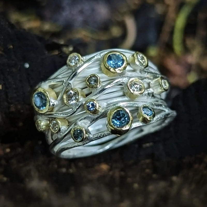 Open Silver And 18ct Yellow Gold Wrap Ring With Diamonds and Aquamarines